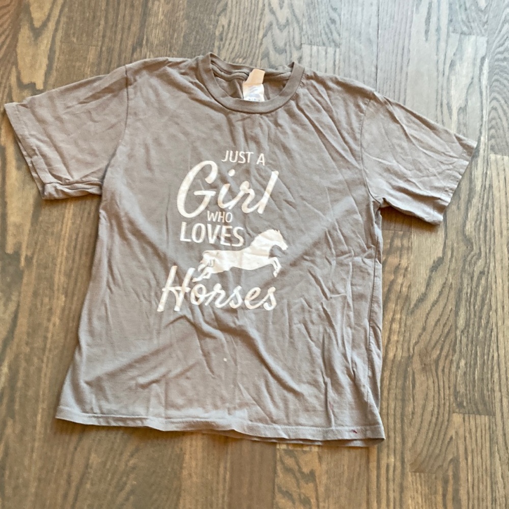 Girl “Just a girl who loves horses shirt”, in a size medium.